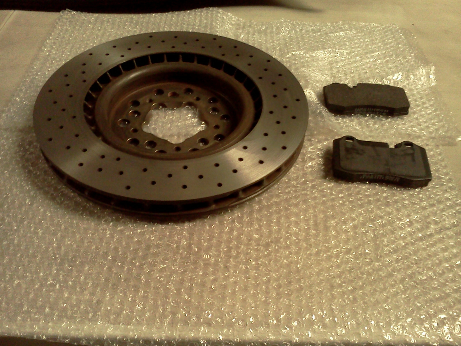This is for ( 1) FERRARI F430 360 FRONT BRAKE 13" ROTOR And Pad's is Oem Part.