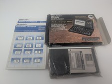 Sharp IQ-8300M 128KB Electronic Organizer Box Manuals Software Parts Repair