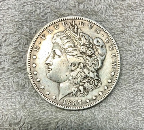 1887 O ( New Orleans ) Morgan Silver Dollar 90% Silver Circulate.