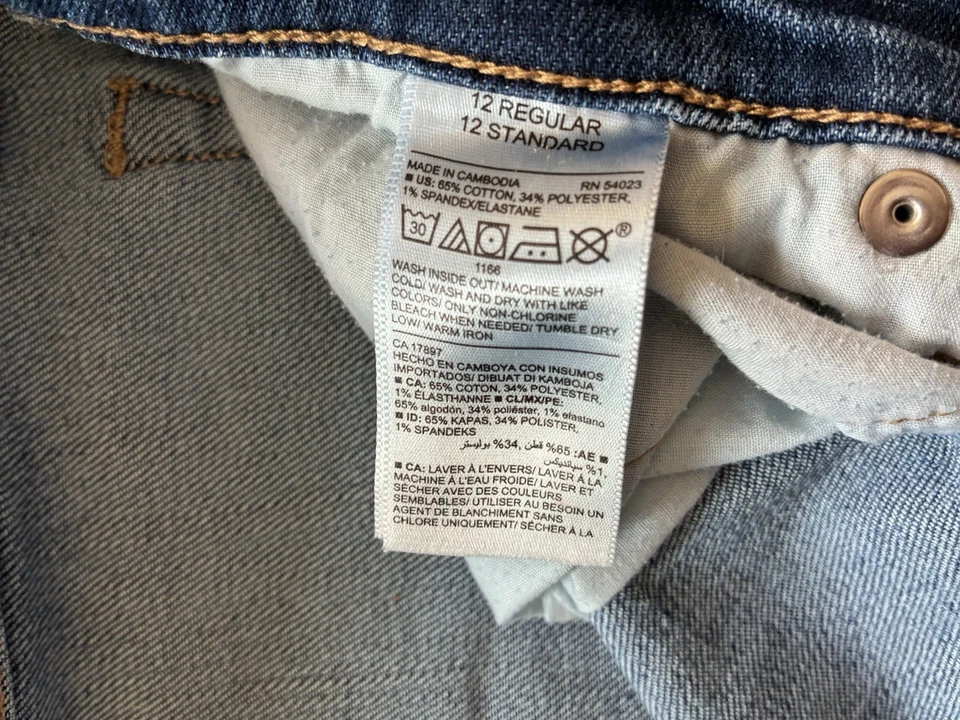 Pantalones de mezclilla elásticos acampanados recortados de tiro medio de algodón Old Navy para mujer azul 12R Foto 4 de 4