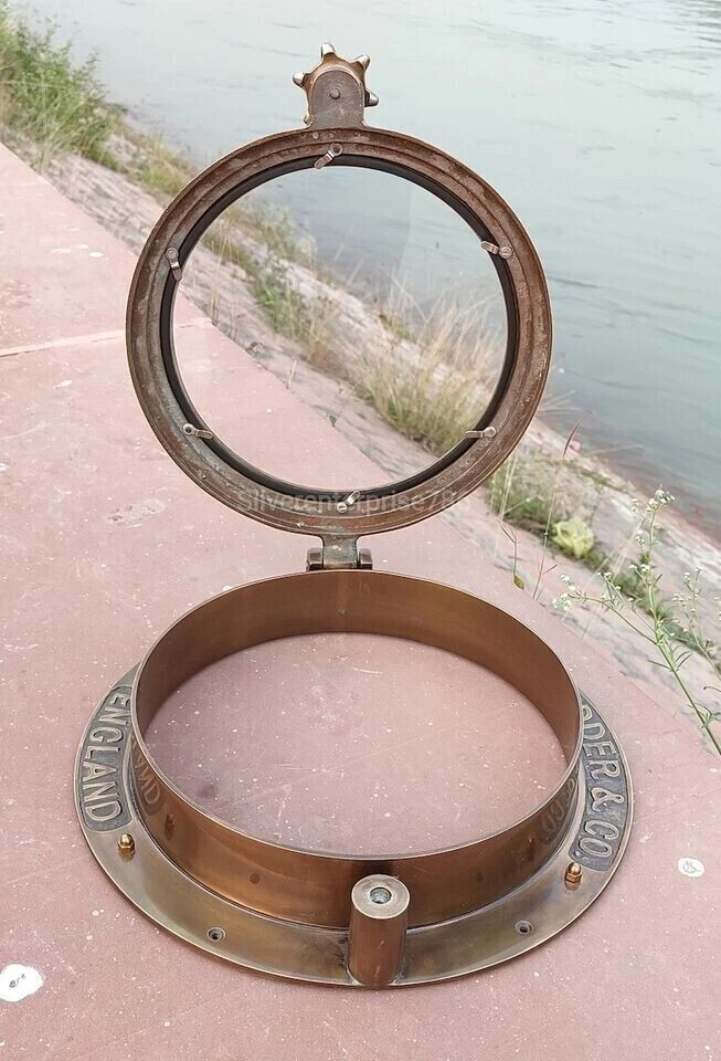 Antigua ventana de latón ojo de buey ventana pesada cabal barco ojo de buey Foto 2 de 4