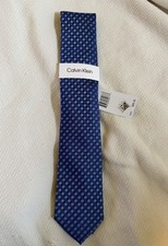 Calvin Klein Men's Silk Blend Tie Navy Blue featuring a stylish circular dot pa
