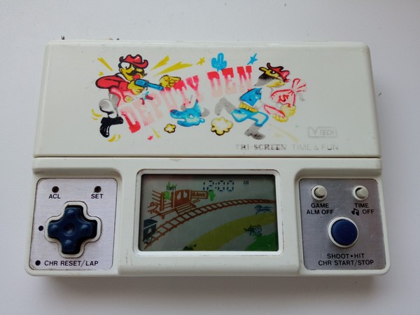 * VTECH  TRI-SCREEN TIME & FUN LCD DEPUTY DEN 1982