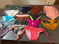 Lot Of 67 NEW Assorted L  SPACE Swimsuit Bikini Tops And Bottoms size Medium.