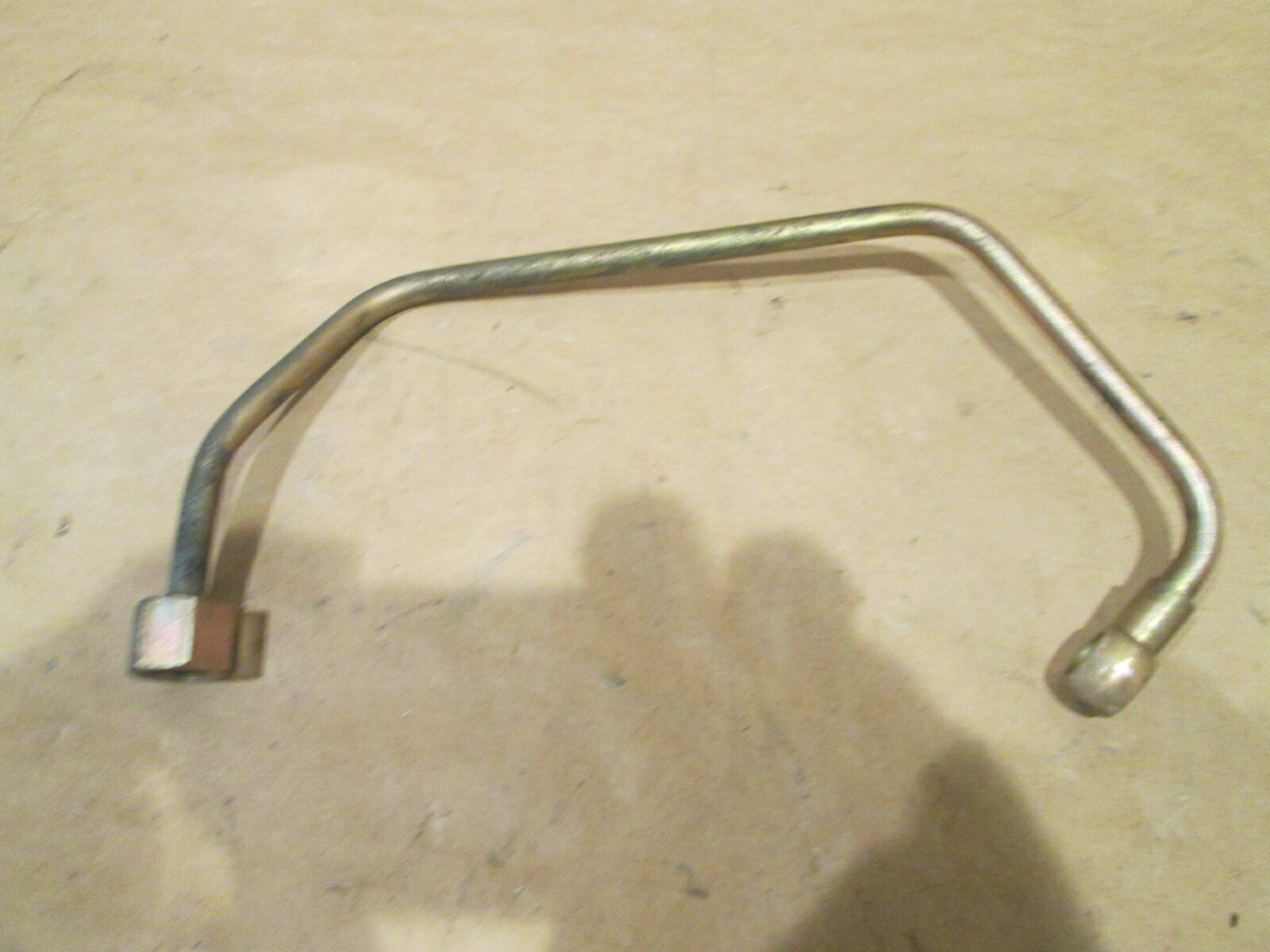 Ferrari Testarossa  LH Fuel Delivery Pipe To Pressure Regulator P/N 125774