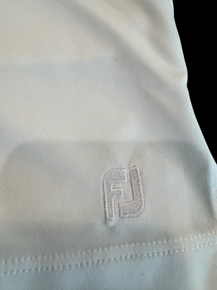 Falda corta de golf FootJoy para mujer talla MED blanca tejida bolsillos Foto 3 de 3
