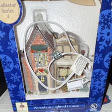 Holiday Seasons Victoria Falls Porcelain Illuminated Christmas Village House