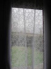 Une paire de voilage blanc -