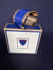 A spinal Navy And Gold Snakeskin Bangle Boxed With Gift Tag