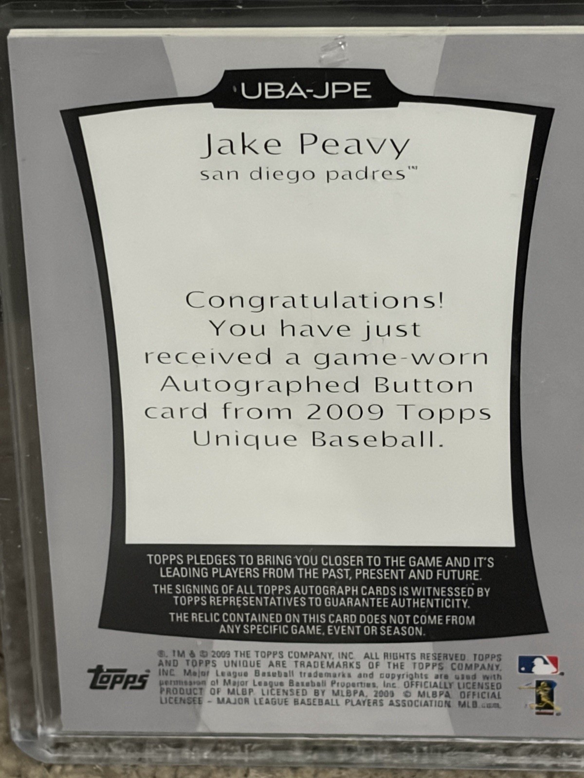 2009 Topps Unique Jake Peavy 3/6 Jersey Button Game Used Padres White Sox UBA-JP view 3