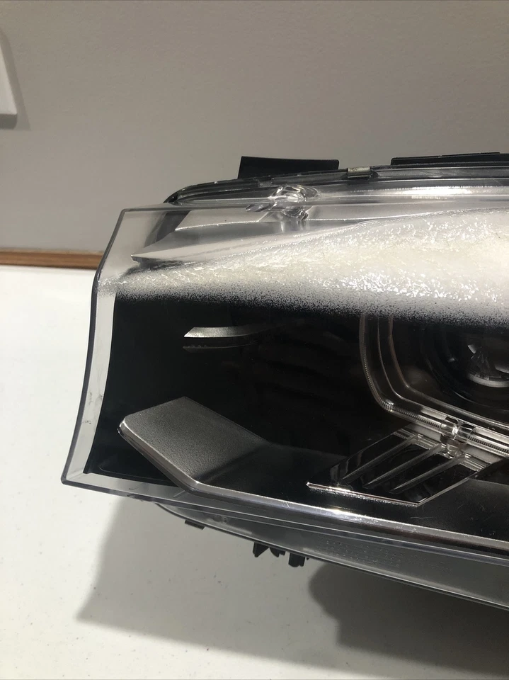 Faro delantero BMW X5 2018 usado lado izquierdo. Lente fundida. Foto 2 de 4