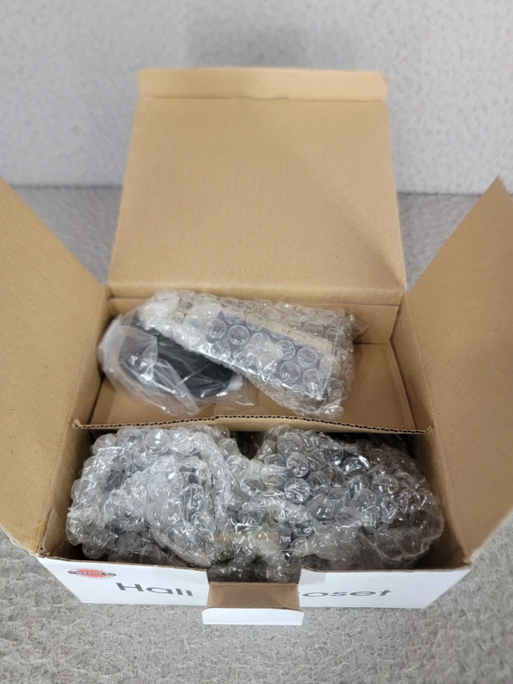 Perilla de palanca de puerta de bronce frotado con aceite Designers Impressions Livingston caja abierta Foto 2 de 4