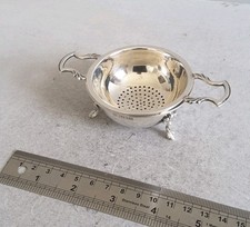 NICE VINTAGE SOLID SILVER TEA STRAINER ON BOWL. 72 gms BIRM. 1961
