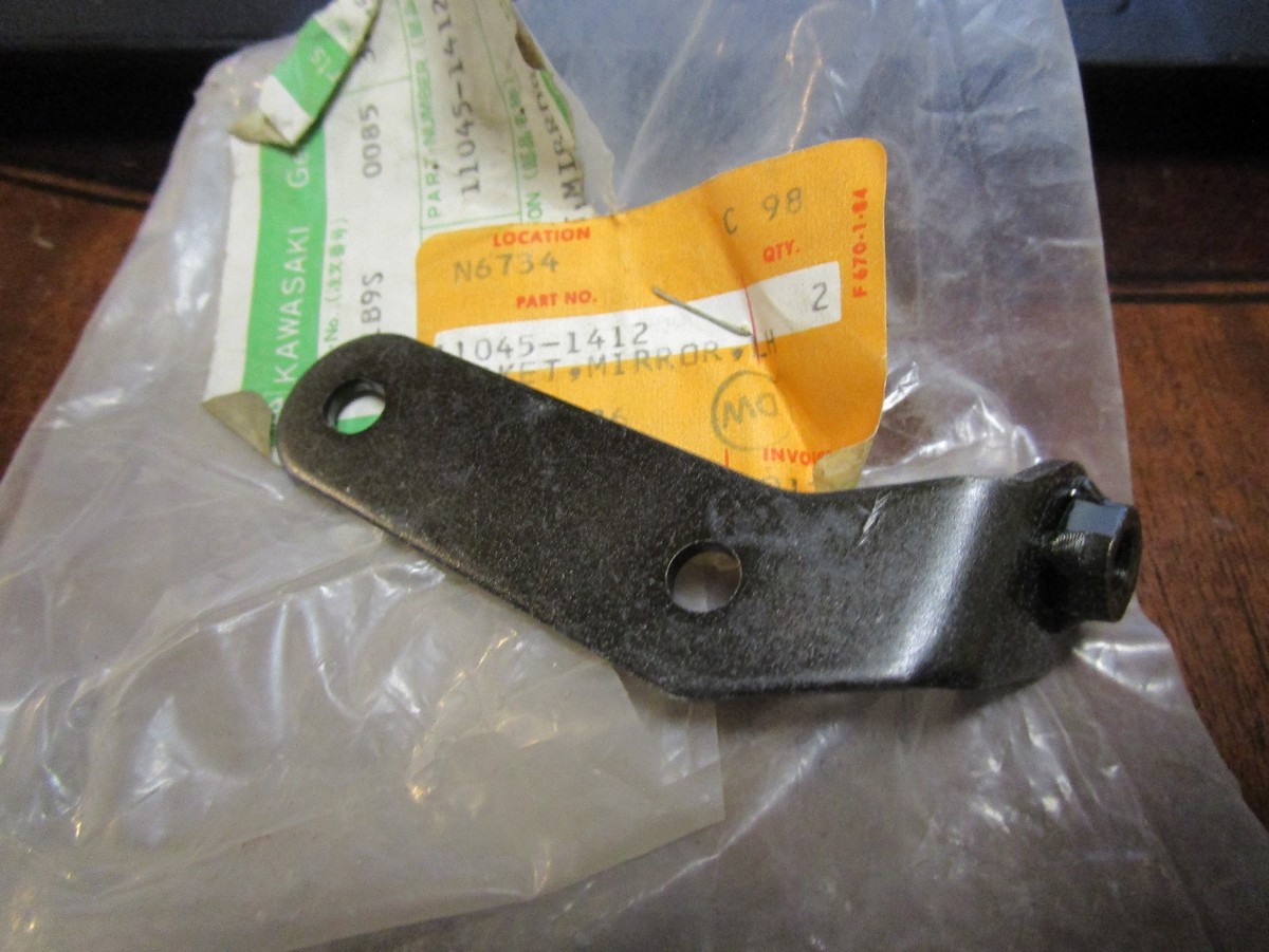 Kawasaki OEM LH bracket new 11045-1412 | eBay