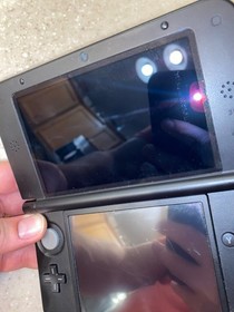 Nintendo 3DS XL Handheld System Red w/4 Games and Charger