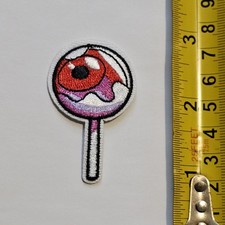 STRANGE EYEBALL CRAZY LOLLIPOP HALLOWEEN SUCKER P162 PATCH HAUNTED DRIP BADGE