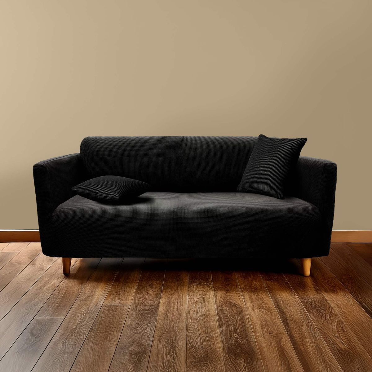 Housse de canapé gaufré Sacha 230cm noir pour rénover un meuble usé