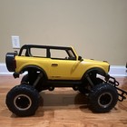 New Bright Ford Bronco RC Off-Road Truck Yellow/Black w/ Large Tires — photo 4