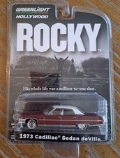 1973 CADILLAC SEDAN DEVILLE BURGUNDY "ROCKY" 1/64 DIECAST BY GREENLIGHT 44950 A