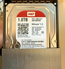 New ListingWestern Digital WD Red 1TB NAS Hard Drive WD10EFRX - in Ex Enclosure w/ Cables
