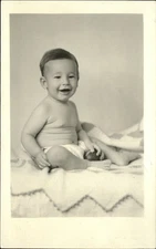 RPPC Cute happy baby with ball studio portrait 1926-1940 real photo postcard