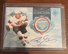 2023-24 Ultimate Collection Ultimate Emblems Auto RC Blue 01/10 Ridly Greig