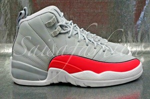 pink and grey jordan 12