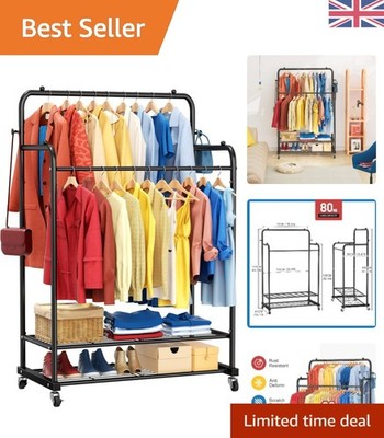 Mühelose Organisation: Kleiderstange aus schwarzem Metall mit Rollen für einfaches Styling