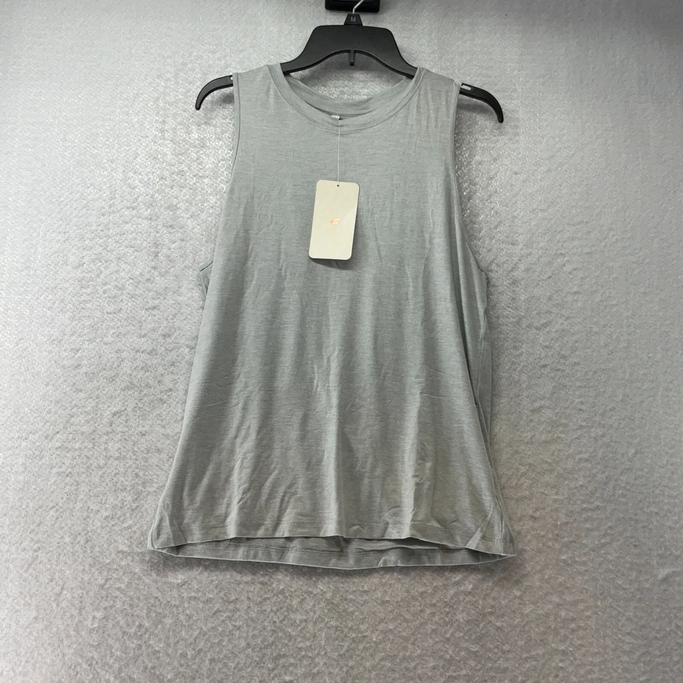 Camiseta sin mangas Fabletics negra espalda abierta para mujer talla L gris claro jaspeado calce relajado Foto 2 de 4