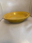 Fiestaware 10 1/4” Pie Plate Deep Dish in the retired color Marigold. Fiesta
