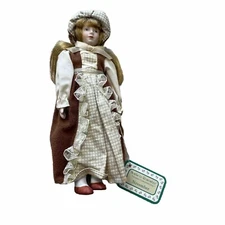 Russ Months to Remember Porcelain Collection 9-inch Doll November w/tags