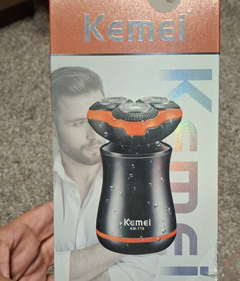 Kemei KM-776 3 Head Rotary Facial Shaver USB Charging Cordless Black/Orange