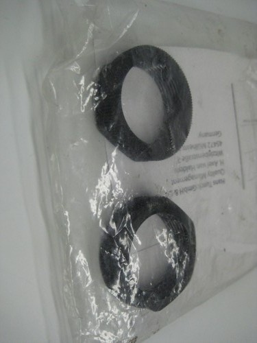 Black rubber O-rings in clear plastic packaging with German text label reading “TURCK M2010093 NSMP.”