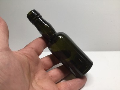 Small Antique Dark Green Sample Size Whiskey Bottle.