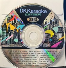 48  DK KARAOKE CDGS LOT MD