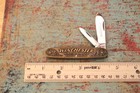 1987 Winchester Arms Co Trade Mark USA Stamped Brass 2 Blade Equal End Knife — photo 1