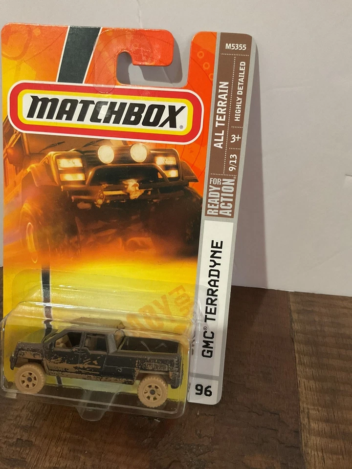 Matchbox GMC Terradyne 2007 todo terreno #96 marrón con barro fundido a presión nuevo en paquete Foto 2 de 4