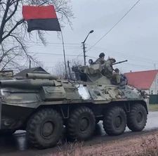 Painted flag of the Ukrainian army with the signature of veterans.