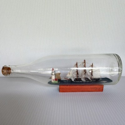 Handmade Hand blown Ship in a Bottle Sailing Ship Model w/ Lighthouse, Wood Base