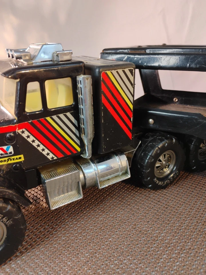 🔥Tractor de juguete de metal Remco Castrol STP Goodyear SEMI de los años 80 plataforma grande Foto 4 de 4