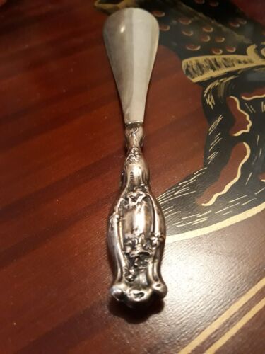 Sterling Silver Shoe Horn 19th C. AMERICAN STERLING SILVER EMBOSSED FLORAL