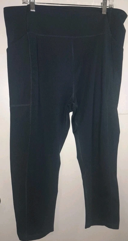 girlfriend-collective high rise compressive capri w pockets leggings