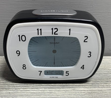 Sharp SPC553 LCD Alarm Clock Battery Operated Snooze Light Analog Display Small
