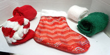 Set of 4 Holiday Fuzzy socks with Christmas stocking