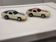 TYCO NITE GLOW RED AND BLUE STRIPED CHEVY CORVETTES HO SLOT CARS