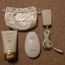 NEWA Lift Facial Beauty Device with charger and storage bag