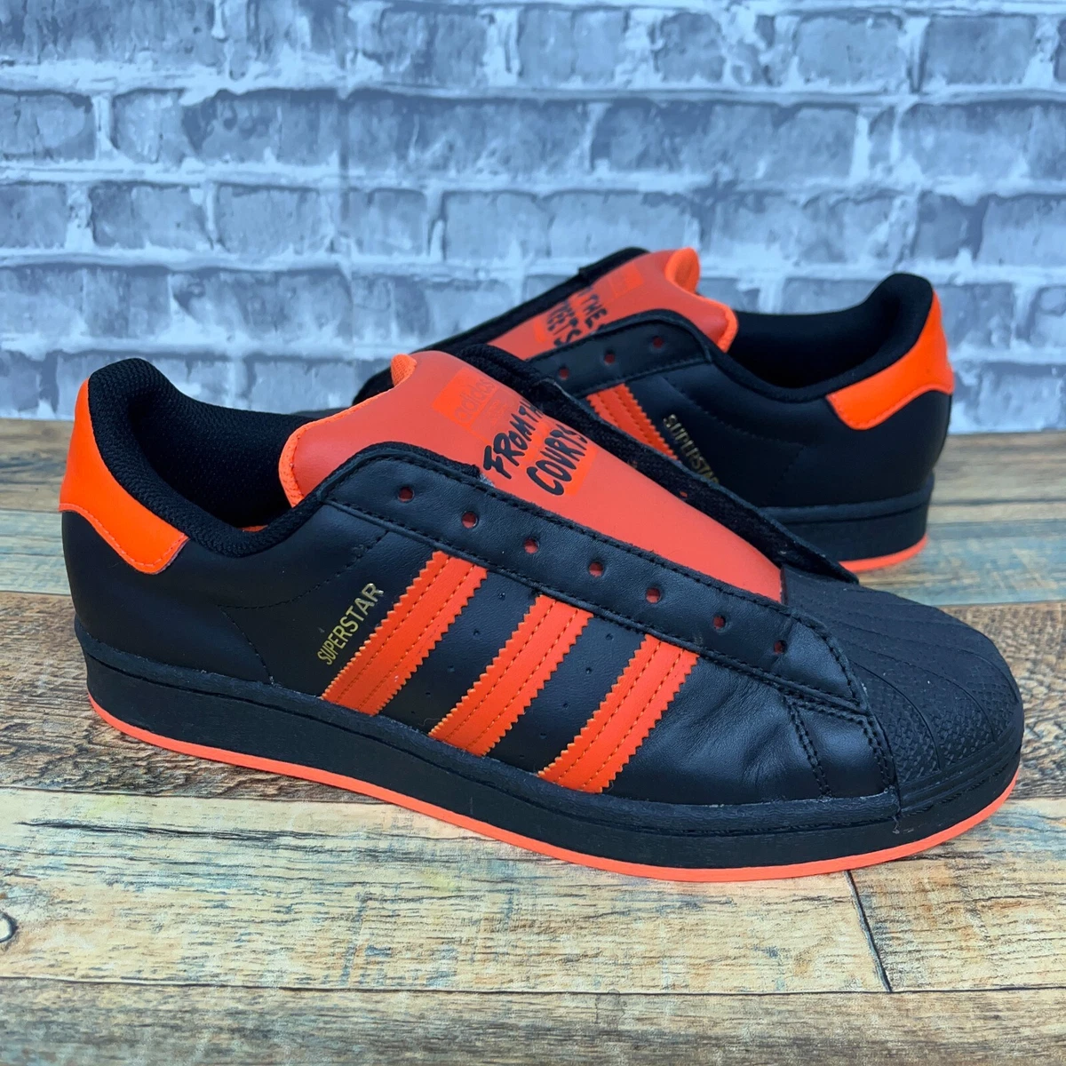 Adidas superstar black and orange top