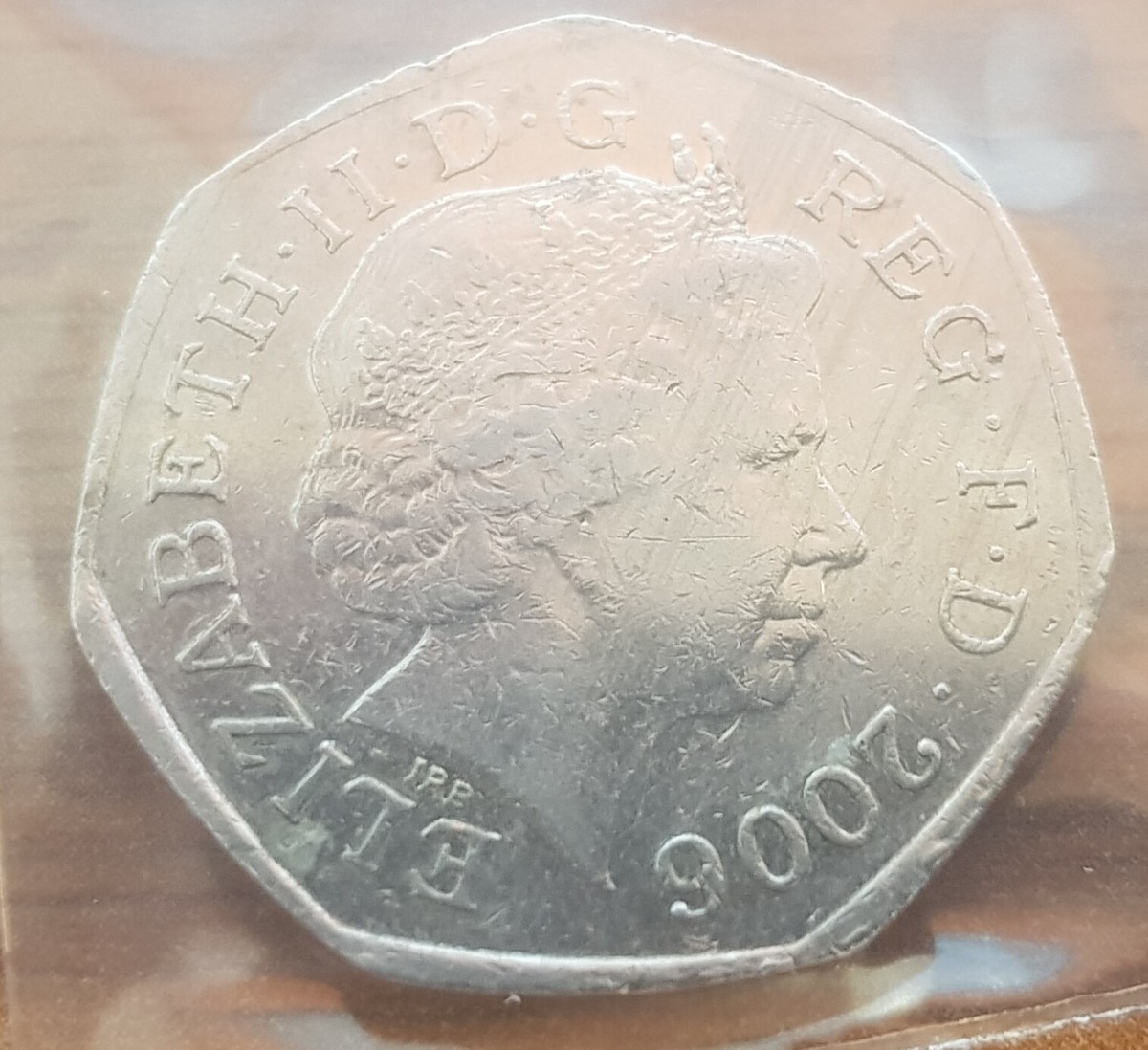 ERR 12) ERROR | 2006 Victory Cross 50P Decimal Coin with slight
