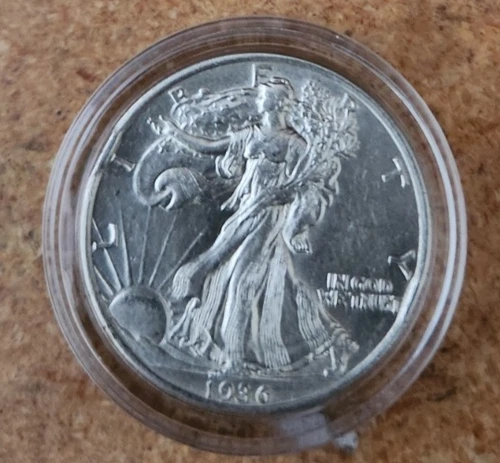1936 p high grade (AU/BU) silver Walking liberty half dollar in acrylic capsule