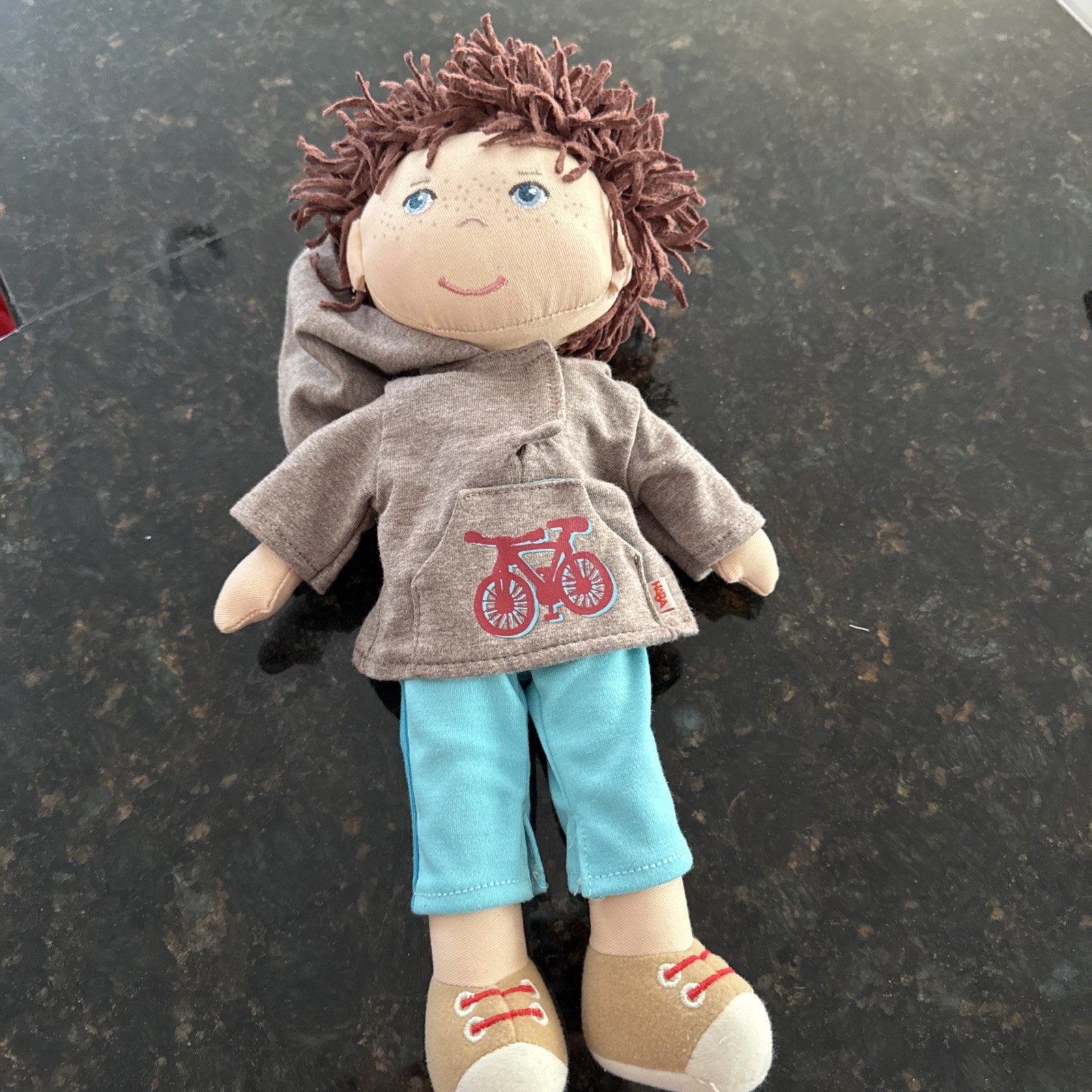 HABA 12 Inch Lian Soft Doll with Removable Clothes and Bike 